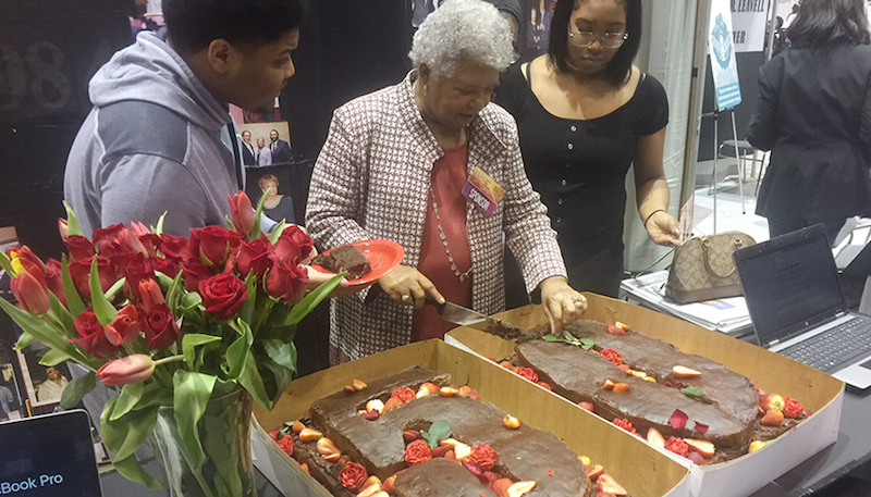 NNPA Chairman Dorothy R. Leavell cuts the cake at the Black Women's Expo in Chicago in celebration of her 50th anniversary as publisher of the Chicago and Gary Crusader newspapers. (Chicago Crusader)