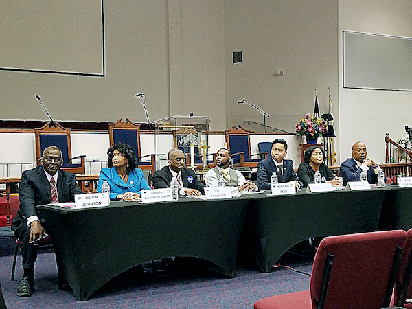 From left: Prince George's County Council at-large candidates Melvin Johnson, Juanita Culbrith-Miller, Councilman Mel Franklin, Reginald Tyer, Julian Lopez, Gerron S. Levi and Calvin Hawkins participate in a May 19 candidates' forum at Greater Mt. Nebo AME Church in Bowie. (William J. Ford/The Washington Informer)