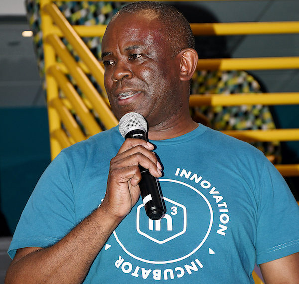 Aaron Saunders, CEO of INC3, speaks to innoMAYtion guests about the mission of INC3 and its progress to help underserved innovation and technology business owners in the Washington area on May 31. (Roy Lewis/The Washington Informer)