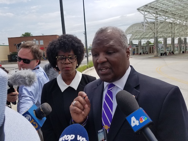 Prince George's County Executive and Maryland gubernatorial hopeful Rushern L. Baker III (right) speaks with reporters during a June 13 press conference at the Takoma Langley Transit Center after former opponent Valerie Ervin (left) announced she would end her bid and formally endorse Baker. (William J. Ford/The Washington Informer)