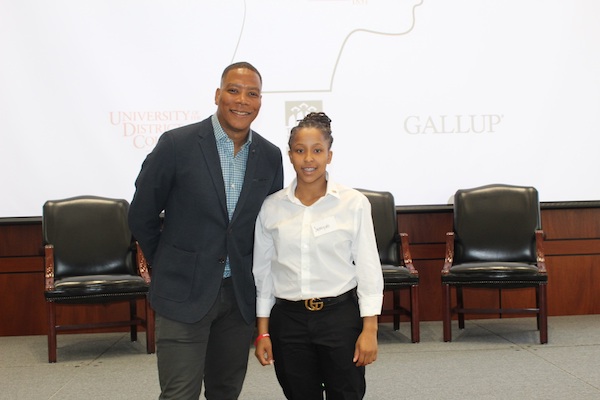 Samiya Hatcher, a recent McKinley Tech High School graduate, poses with WUSA-TV's Reese Waters, who was the emcee for the Capital Builders Center's "Signing Day" event in the Great Room in the Gallup Building in D.C. on June 15. (Brigette White/The Washington Informer)