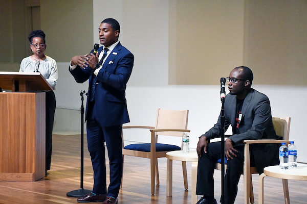 Marcus Goodwin (center) and Jeremiah Lowery (right), candidates for an at-large seat on the D.C. Council at a candidate.’s forum hosted by the ACLU and moderated by Denise Rolark Barnes (left), publisher of The Washington Informer, at the First Church of Christ in Northwest on May 30. (Roy Lewis/The Washington Informer)