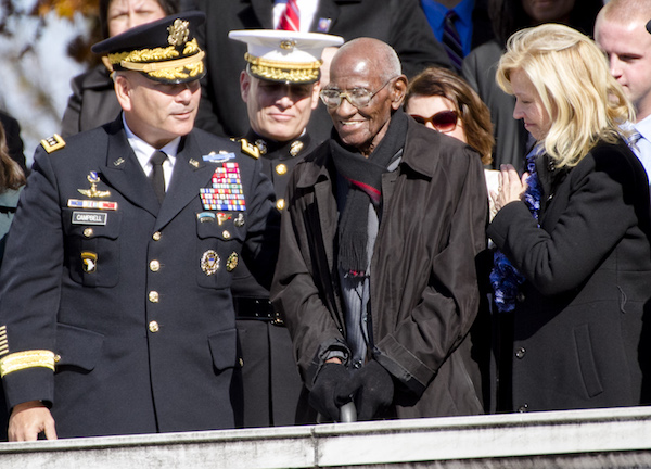 **FILE** Richard Overton stands as President Barack Obama acknowledges him as America's oldest living World War II veteran during a Veterans Day ceremony at Arlington National Cemetery on Nov. 11, 2013. (Staff Sgt. Sean K. Harper/Army News Service)