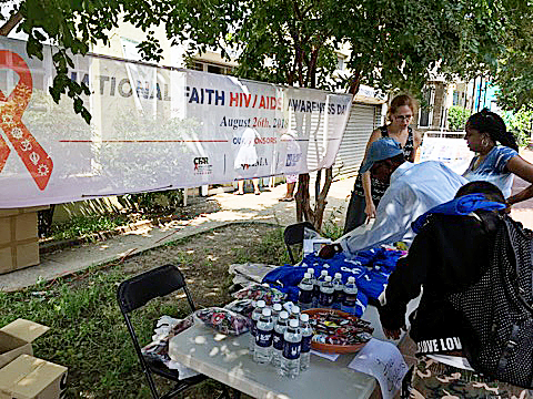 Physician Mary Degezia answers questions about HIV testing and STD prevention during the second annual National Faith HIV/AIDS Awareness Day at America's Islamic Heritage Museum in Southeast on Aug. 26. (Sheena Foster)