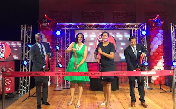 **FILE** D.C. Mayor Muriel Bowser (second from right) participates in the launch of the city's first government radio station, in partnership with WHUR, in a 2017 ceremony. (Courtesy of the mayor's office via Twitter)