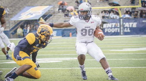 Howard University's Dedrick Parson avoids the defense on the way to a 74-yard touchdown run. (Photo by David Sierra)