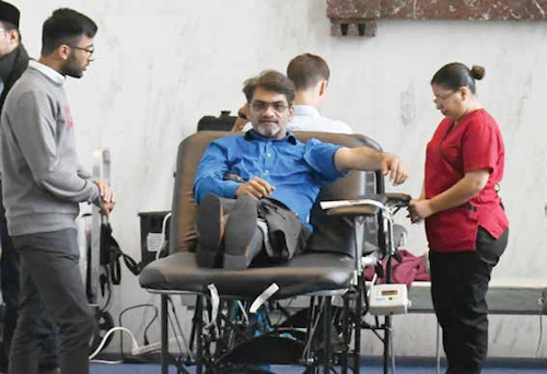 The eighth annual Ahmadiyya Muslim Community USA and American Red Cross blood drive is held in the Rayburn Office Building in D.C. on Sept. 11. (Roy Lewis/The Washington Informer)