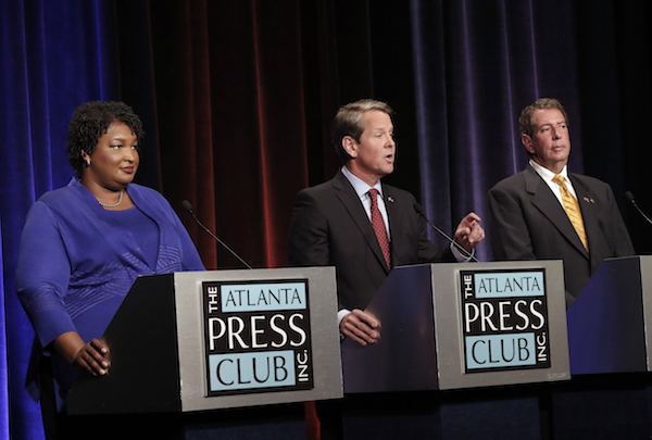 From left: Georgia gubernatorial candidates Democrat Stacey Abrams, Republican Brian Kemp and Libertarian Ted Metz debate at Georgia Public Broadcasting in Midtown October 23, 2018 in Atlanta, Georgia. (Photo by John Bazemore-Pool/Getty Images)