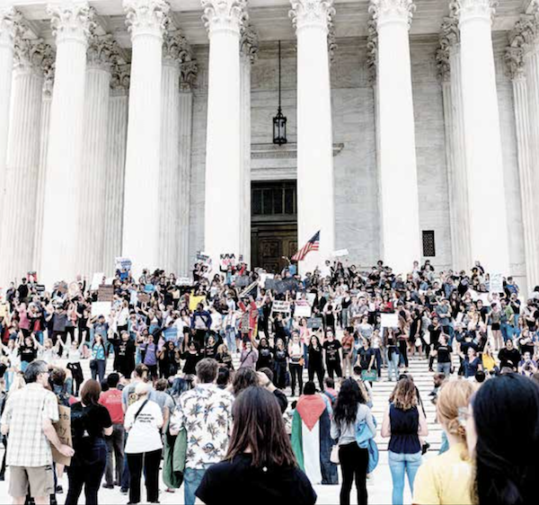 A large group of women take to the steps of the U.S Supreme Court in protest shortly after Brett Kavanaugh’s confirmation was announced on Oct. 6. (Michael A. McCoy)