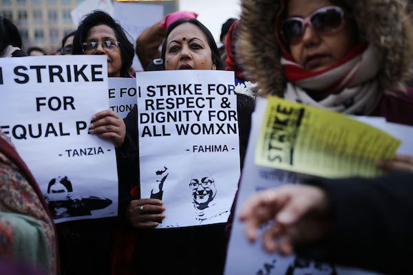 A group of women attend a rally and march in Washington Square Park for International Women's Day on March 8, 2018, in New York City. Around the world, thousands of women are occupying the streets, refusing to work and boycotting domestic tasks in a response to a call for a global women's strike on Thursday. In Spain large groups of women have taken to the streets to protest a gender pay gap of 19% in the private sector. (Photo by Spencer Platt/Getty Images)