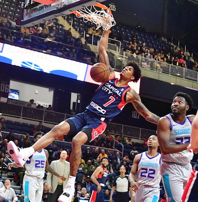 Capital City Go-Go forward Devin Robinson (7) completes a dunk during a 107-105 overtime loss to the Greensboro Swarm at the St. Elizabeths East Entertainment and Sports Arena in D.C. on Nov. 3. (John E. De Freitas/The Washington Informer)