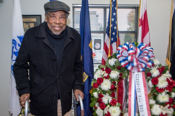 John N. Miller, 95, a resident at Access Housing, Inc., DC, a housing facility in Southeast for homeless veterans, spent Veterans Day with friends reminiscing over their days of military service. (Shevry Lassiter/The Washington Informer)