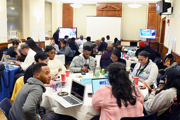 Students from Howard University and others schools in the D.C. area participate in the Get Out the Vote campaign as part of National Coalition on Black Civic Participation and the Ronald W. Walters Leadership & Policy Center in Northwest on Nov. 6. (Roy Lewis/The Washington Informer)