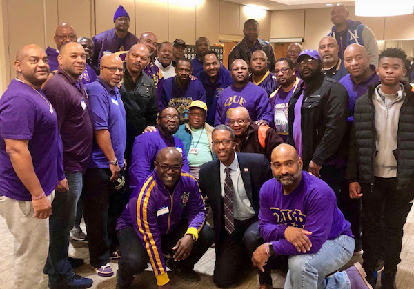 D.C. Council member Kenyan McDuffie visits the Armed Forces Retirement Home-Washington in Northwest with veterans and members of the Lambda Gamma Gamma Chapter of Omega Psi Phi Fraternity, Inc., for Veterans Day on Nov. 12. (Courtesy of McDuffie)