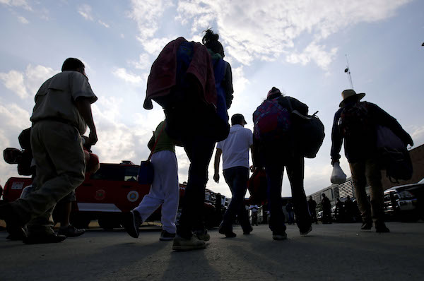 Central American migrants moving in a caravan towards the United States head to a shelter in the outskirts of Zapotlanejo, Jalisco state, Mexico, on Nov. 11, 2018. (Photo by Ulises Ruiz/AFP/Getty Images)