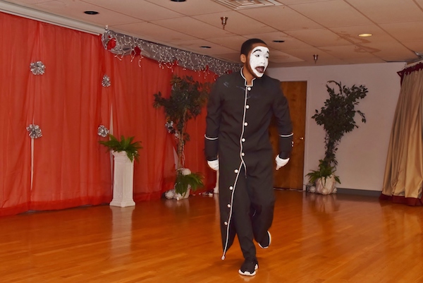 Blake Myles Hopkins performs a mime routine at a King holiday prayer breakfast held at Matthews Memorial Baptist Church in southeast D.C. on Jan. 12. (Courtesy photo/Maurice G. Fitzgerald)