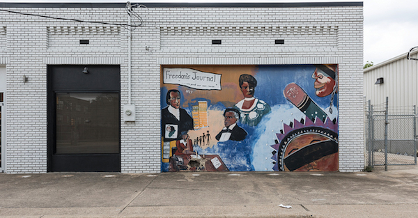 A mural depicting the Freedom's Journal mural is seen outside the offices of the Dallas Weekly, a newspaper that reports on events in the African-American community in Dallas. (NNPA Newswire)