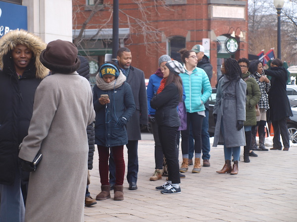 Lines of furloughed federal employees snake downtown D.C. for blocks. (Shantella Y. Sherman/The Washington Informer)