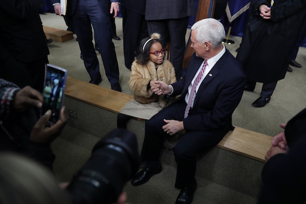 Vice President Mike Pence shakes hands with 4H member Rayan Bundy, 7, of Loudoun, Maryland, after the signing ceremony for the Agriculture Improvement Act in the South Court Auditorium of the Eisenhower Executive Office Building Dec. 20, 2018 in Washington, D.C. Designed to go through the 2023 crop year, this farm bill is the first since 1990 that was enacted within the year for which programs were authorized. (Photo by Chip Somodevilla/Getty Images)