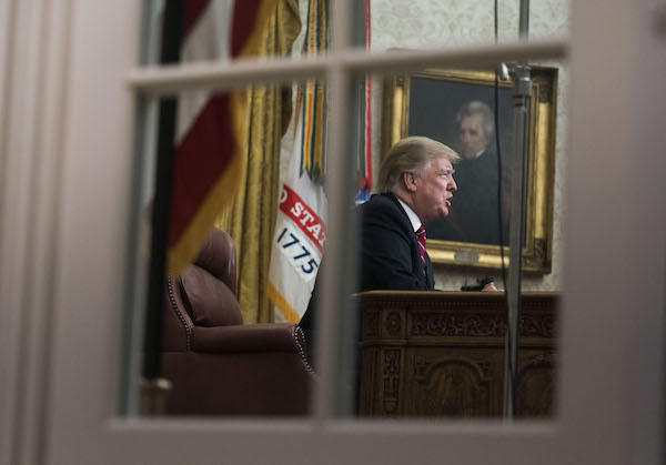 U.S. President Donald Trump speaks during an address on border security in the Oval Office of the White House in Washington, D.C., U.S., on Tuesday, Jan. 8, 2019. Trump demanded Congress provide billions more for border security in a prime-time address to the nation, stopping short of declaring a national emergency and giving little indication of a quick end to a paralyzing political dispute over his proposed wall on the Mexican border. Photographer: Kevin Dietsch/Pool via Bloomberg