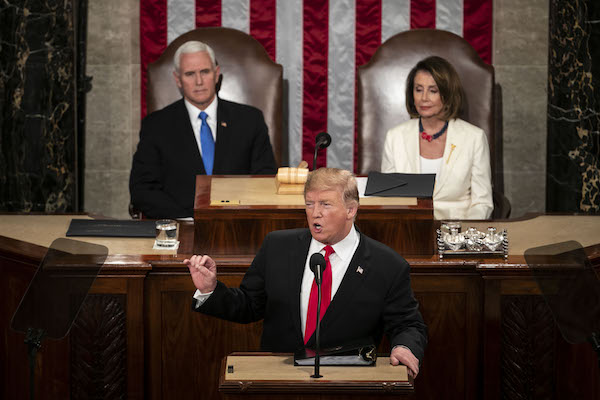 U.S. President Donald Trump delivers a State of the Union address to a joint session of Congress at the U.S. Capitol in Washington, D.C., U.S., on Tuesday, Feb. 5, 2019. Trump will speak to a House chamber full of Democrats jostling to challenge his re-election, with many female lawmakers planning to dress in suffragette white and his chief antagonist Nancy Pelosi seated at the dais behind him. Photographer: Al Drago/Bloomberg via Getty Images