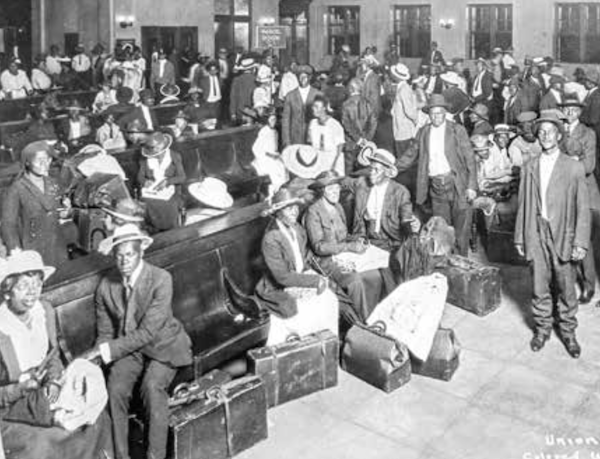 African Americans wait for a northbound train in Jacksonville, Florida, in 1921. (Courtesy of Upfront Scholastic)