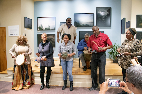 Storyteller and musicians share the good news. (WI photographer)