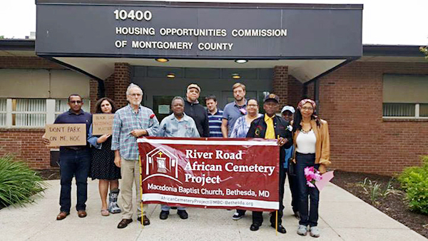 **FILE** A protest held Nov. 1, 2017, pending the desecration of Bethesda African Cemetery at Housing Opportunities Commission in Kensington, Md. The Housing Opportunities Commission, along with developer Regency Centers. The cemetery is the final resting place of members of River Road’s once thriving African American community, dating back to the first generation of freed enslaved persons. (Courtesy of HOC)