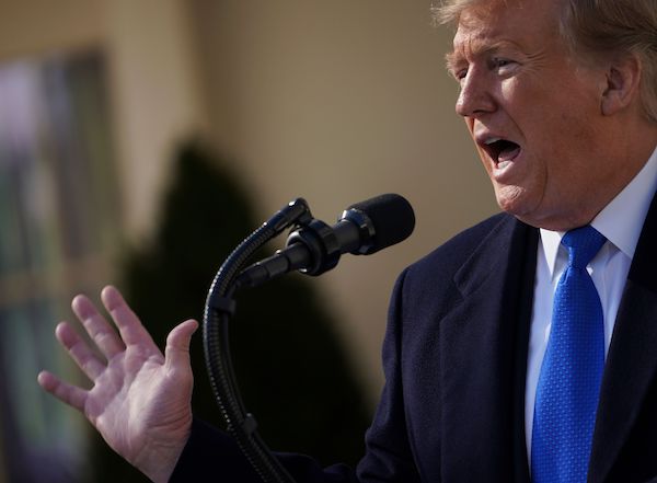 President Donald Trump announces that he will declare a national emergency in order to build a barrier on the U.S.-Mexico border without funding from Congress during a press conference in the Rose Garden at the White House in Washington, D.C., on Feb. 15, 2019. (Brendan Smialowski/AFP/Getty Images)