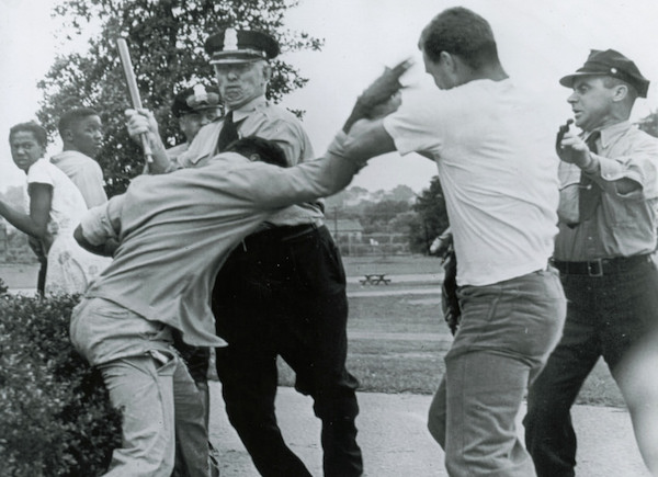 Police contribute to the confusion during white mob violence at a newly integrated federal D.C.-area pool in 1949. (Courtesy photo)