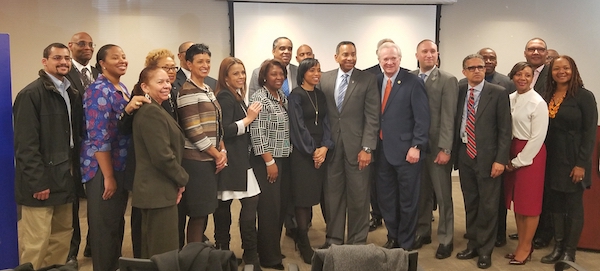 Prince George's County Executive Angela Alsobrooks (center) poses with members of transition team in Largo on March 5. Alsobrooks reviewed recommendations and strategies from 12 groups on ways to improve the county. (William J. Ford/The Washington Informer)