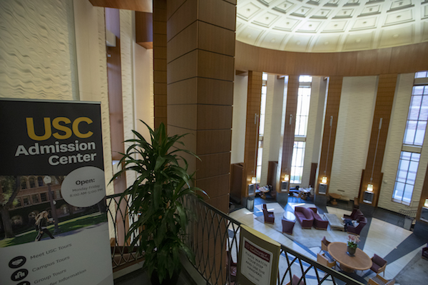 A view of the entrance to the USC Admission Center in the Ronald Tutor Campus Center at the University of Southern California in Los Angeles, Calif., on March 12, 2019. Federal prosecutors say their investigation dubbed Operation Varsity Blues blows the lid off an audacious college admissions fraud scheme aimed at getting the children of the rich and powerful into elite universities. According to prosecutors, wealthy parents paid a firm to help their children cheat on college entrance exams and falsify athletic records of students to enable them to secure admission to schools such as UCLA, USC, Stanford, Yale and Georgetown. Two USC athletic department employees ? a high-ranking administrator and a legendary head coach ? were fired Tuesday after being indicted in federal court in Massachusetts for their alleged roles in a racketeering conspiracy that helped students get into elite colleges and universities by falsely designating them as recruited athletes. (Allen J. Schaben/Los Angeles Times via Getty Images)