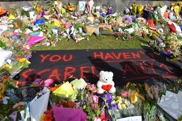 Flowers and condolences are seen near Masjid Al Noor Mosque during a public vigil, close to the shooting area, in Christchurch, New Zealand on March 20, 2019. At least 50 people were reportedly killed in twin terror attacks targeting mosques in Christchurch, New Zealand, an official said on Friday. Witnesses claim the Al Noor Mosque was targeted by armed assailants and there were up to 200 people inside for Friday Prayers. (Photo by Recep Sakar/Anadolu Agency/Getty Images)