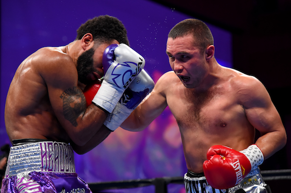 Sergey Lipinets punches Lamont Peterson during their welterweight fight at The Theater at MGM National Harbor on March 24, 2019, in Oxon Hill, Maryland. (Photo by Will Newton/Getty Images)