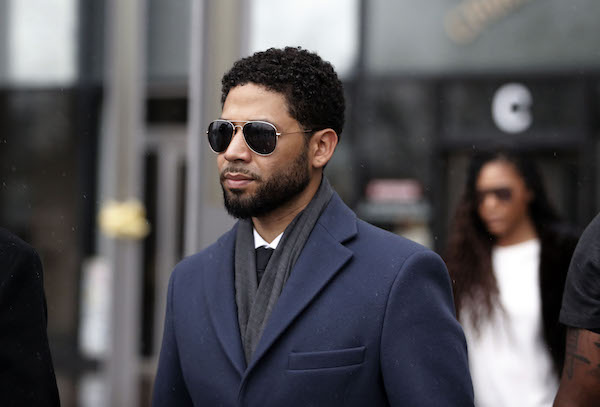 **FILE** Actor Jussie Smollett leaves Leighton Criminal Courthouse after his court appearance in Chicago on March 14, 2019. Smollett stands accused of arranging a homophobic, racist attack against himself in an attempt to raise his profile because he was dissatisfied with his salary on the Fox television drama "Empire." (Photo by Nuccio DiNuzzo/Getty Images)