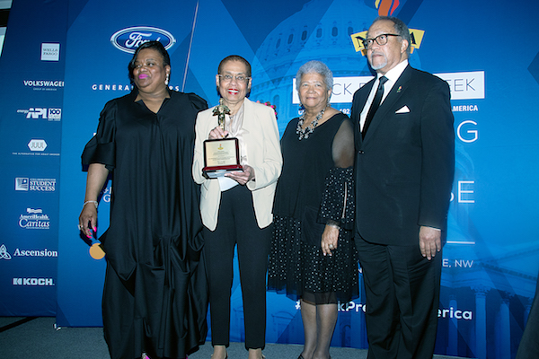 Del. Eleanor Holmes Norton (second from left), recipient of the Torch Award for Outstanding Leadership and Achievement in Support of the Black Press of America, poses with the award at a March 21 event during Black Press Week while alongside Amelia Ashley-Ward (left), NNPA Chair Dorothy Leavell (second from right) and Benjamin Chavis, NNPA president and CEO. (Shevry Lassiter/The Washington Informer)