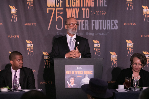 Michael Lomax, president and chief executive officer of the United Negro College Fund, delivers the inaugural State of the HBCU address, hosted by Bakari Sellers (left), at the Hyatt Regency in northwest D.C. on March 5. (Shevry Lassiter/The Washington Informer)