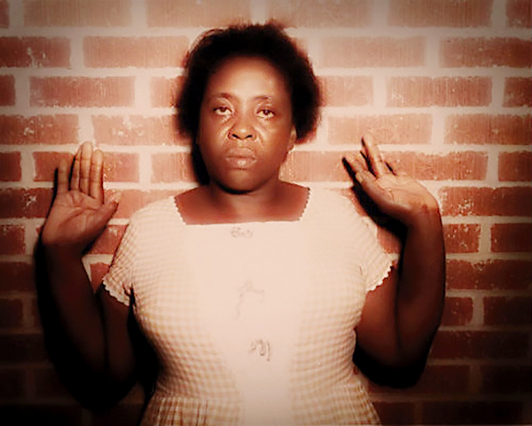 Fannie Lou Hamer after being beaten in jail, June 1963 (FBI photo)