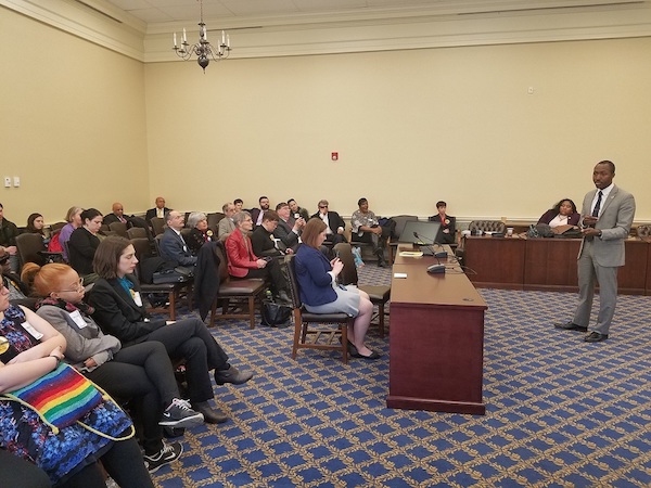 Maryland Del. Jazz Lewis (right) speaks with criminal justice advocates on March 12 before he and Del. Wanika Fisher present their sponsored legislation to limit and ban the use of solitary confinement in state jails and prisons. (William J. Ford/The Washington Informer)