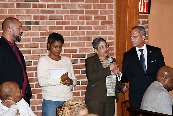 Deborah Evans-Bailey, mother of murder victim Kendra Smith, asks about the long list of outstanding murders in the District of Columbia, and when will some of them be solved during a community forum in northeast D.C. on March 11. (Roy Lewis/The Washington Informer)