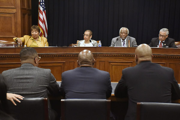 D.C. Del. Eleanor Holmes Norton (second from left) and Rep. Danny K. Davis (second from right), co-chairs of the Congressional Caucus on Black Men and Boys, hold a caucus hearing with Rep. Eddie Bernice Johnson (left) and Rep. Bobby Scott (right) on mentoring programs for Black men and boys on March 12. (Robert R. Roberts/The Washington Informer)