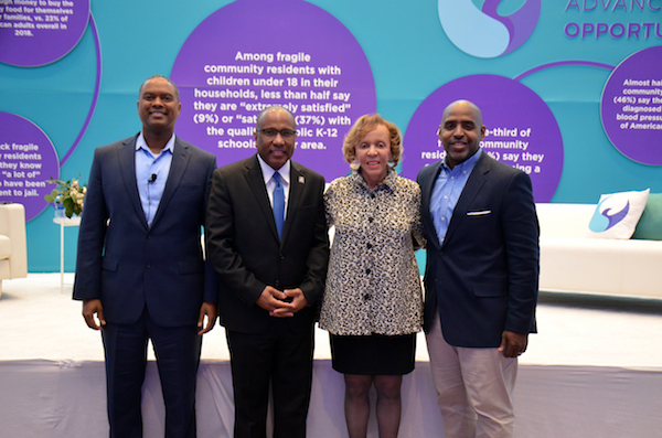 CAO Executive Director Gerard Robinson, Thurgood Marshall College Fund President and CEO Harry Williams, Thurgood Marshall College Fund founder N. Joyce Payne, and Thurgood Marshall Executive Vice President of Business Development and Innovation and Entrepreneurship George Spencer pose for a photo at the release of the Center for Advancing Opportunity's State of Opportunity in America report in Northwest during a three day-summit from April 14-16. (Anthony Tilghman/The Washington Informer)
