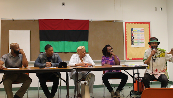 Charles View, Tone P, Wanda Henderson, Sam P.K. Collins and Senghor Baye at Lamond-Riggs Neighborhood Library on April 14 (Courtesy photo)