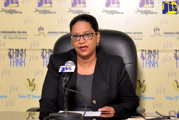 Nicola Russell, manager of the the Development Bank of Jamaica's Public-Private Partnership and Privatisation division, speaks at a JIS think tank event. (Courtesy of JIS)