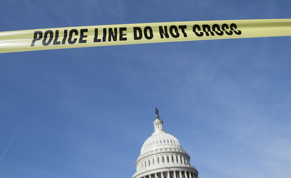 **FILE** Yellow police tape on the East Plaza with the Capitol dome in the background on Wednesday, March 13, 2019. (Photo By Bill Clark/CQ Roll Call)