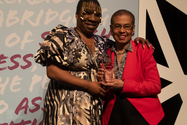 D.C. Del. Eleanor Holmes Norton and #MeToo movement founder Tarana J. Burke embrace at the fourth annual First Expressions Awards at the Newseum in D.C. on April 4. (Shevry Lassiter/The Washington Informer)