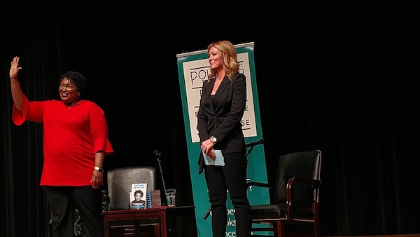 Politician and author Stacey Abrams (left) shares the spotlight with CNN anchor Brooke Baldwin during an interview at the University of the District of Columbia on April 9. (Brenda C. Siler/The Washington Informer)
