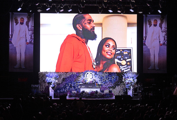 Photos are displayed during Nipsey Hussle's Celebration of Life at Staples Center on April 11, 2019 in Los Angeles, California. Nipsey Hussle was shot and killed in front of his store, The Marathon Clothing, on March 31, 2019 in Los Angeles. (Photo by Kevork Djansezian/Getty Images For Atlantic Records)