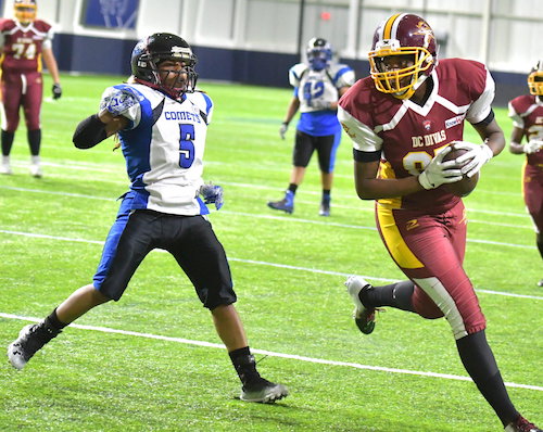 D.C. Divas wide receiver Kentrina Wilson outruns Columbus Comets defensive back DiaSha Pearson to score a touchdown during the Divas' 58-28 win at the St. James Sports Complex in Springfield, Virginia, on Saturday, May 25. (John E. De Freitas/The Washington Informer)