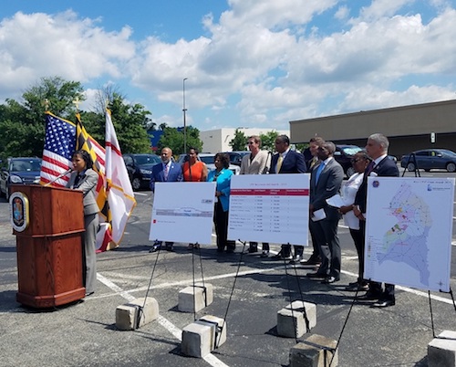 Prince George's County Executive Angela Alsobrooks speaks during a May 31 press conference at The Landing at Woodyard shopping center in Clinton to announce that nine county shopping centers will receive $1.9 million for façade improvements and other upgrades. (William J. Ford/The Washington Informer)